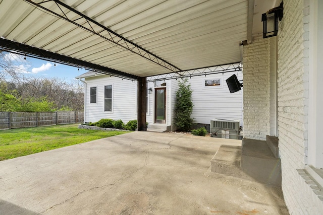 view of patio featuring fence, cooling unit, and entry steps