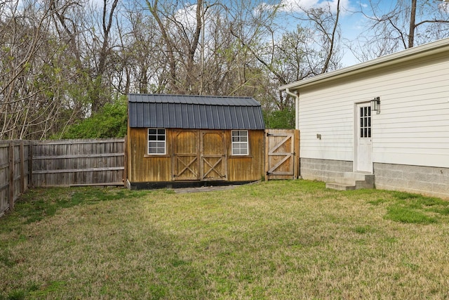 view of shed featuring a fenced backyard