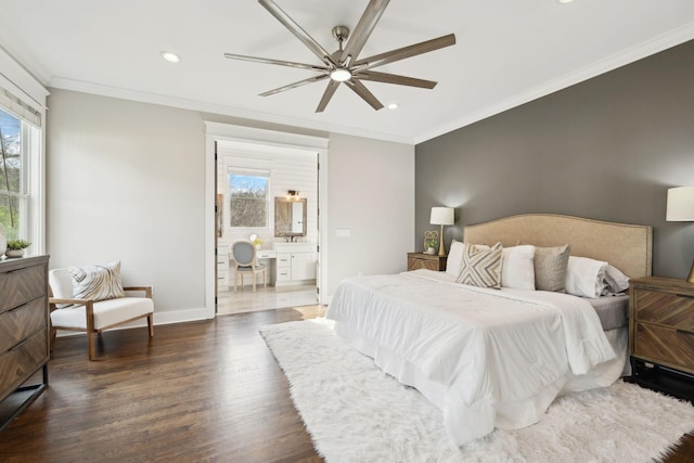 bedroom with crown molding, baseboards, wood finished floors, recessed lighting, and ensuite bath