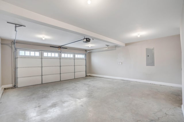 garage with baseboards, a garage door opener, and electric panel