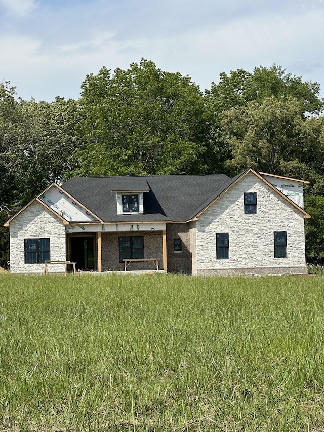 49 Copperas Creek Rd, Tullahoma, TN 37388 - view of front of house featuring stone siding and a front yard
