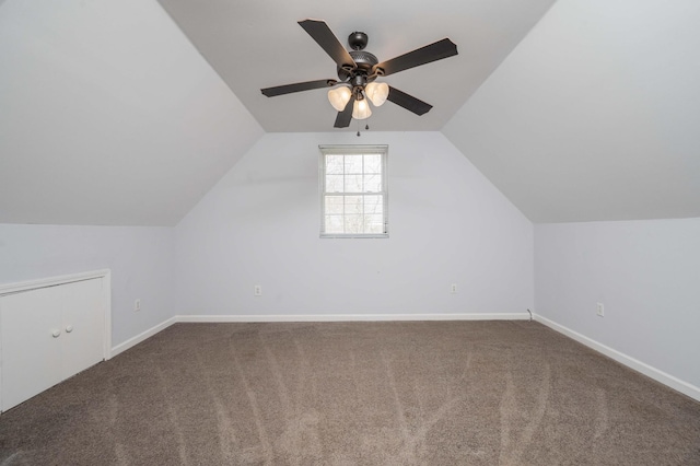 bonus room with baseboards, vaulted ceiling, ceiling fan, and carpet flooring