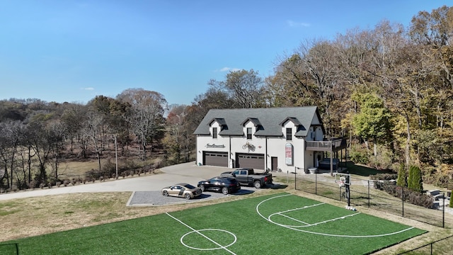 7990 Poplar Creek Rd, Nashville, TN 37221 - view of basketball court with a lawn and fence