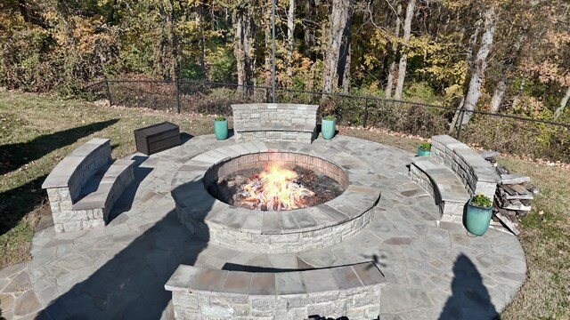 7990 Poplar Creek Rd, Nashville, TN 37221 - view of patio featuring a fire pit and fence