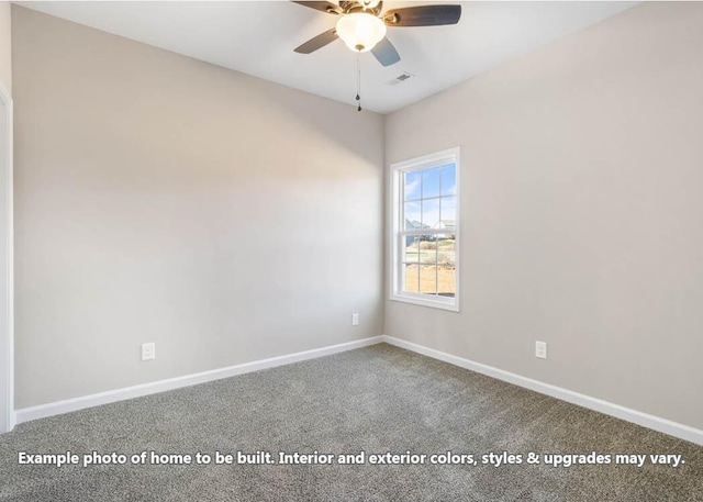 spare room with baseboards, ceiling fan, visible vents, and carpet