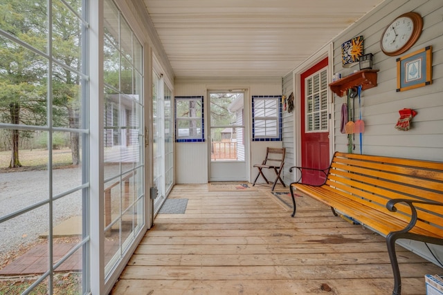 sunroom with hardwood / wood-style floors
