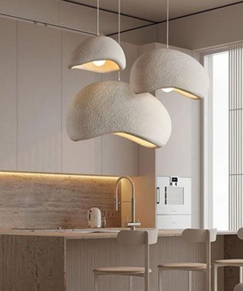 kitchen featuring a wealth of natural light, tasteful backsplash, and a sink