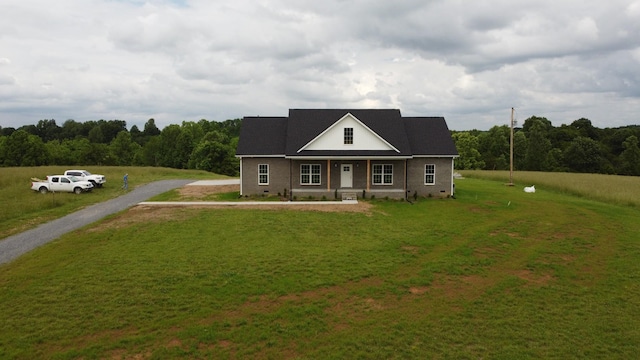 1452 Purtle Rd, Lafayette, TN 37083 - view of front facade featuring a front yard, a porch, and driveway