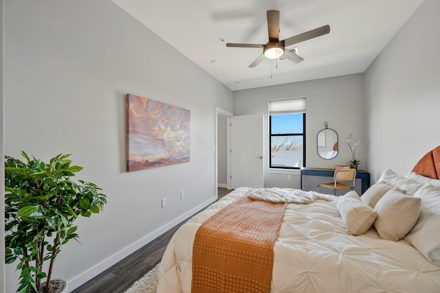 1900 12th Ave S Unit 404, Nashville, TN 37203 - bedroom with wood finished floors, baseboards, and ceiling fan