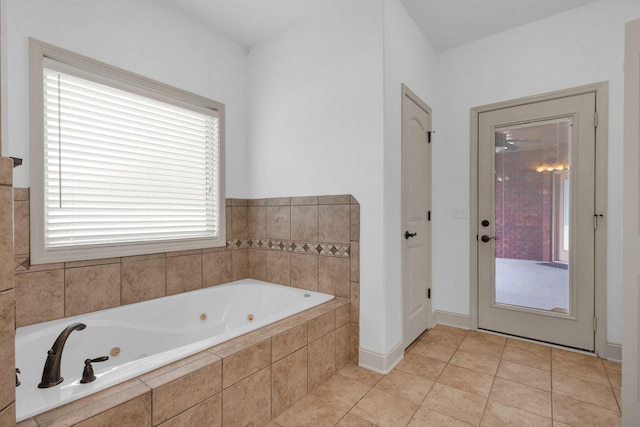 2726 Wynthrope Hall Dr, Murfreesboro, TN 37129 - full bathroom with a whirlpool tub, tile patterned flooring, and baseboards