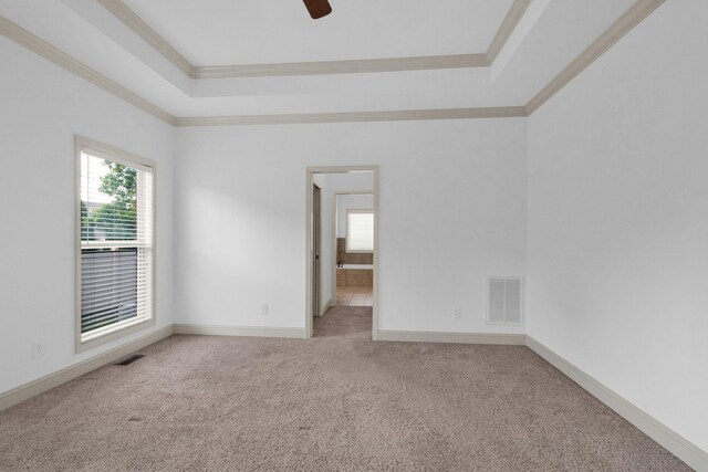 2726 Wynthrope Hall Dr, Murfreesboro, TN 37129 - carpeted spare room with a tray ceiling, crown molding, a ceiling fan, and baseboards