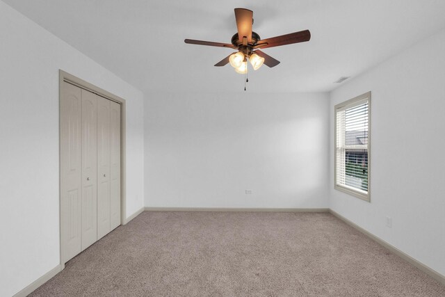2726 Wynthrope Hall Dr, Murfreesboro, TN 37129 - unfurnished bedroom with carpet floors, a closet, ceiling fan, and baseboards