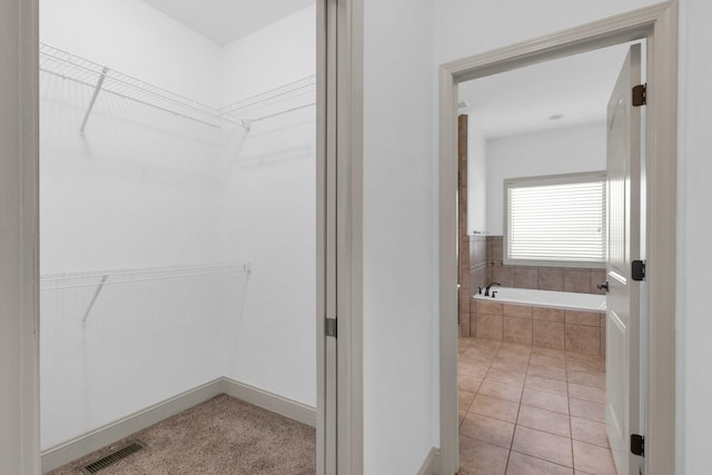 2726 Wynthrope Hall Dr, Murfreesboro, TN 37129 - bathroom with a garden tub and a walk in closet