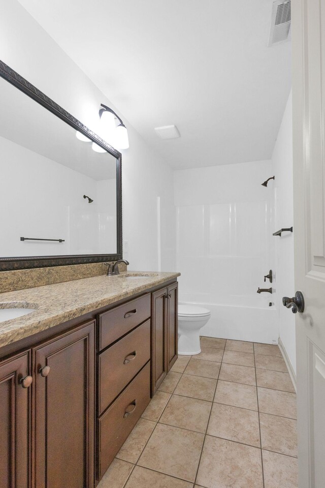 2726 Wynthrope Hall Dr, Murfreesboro, TN 37129 - bathroom with toilet, double vanity, tile patterned floors, and shower / bathtub combination