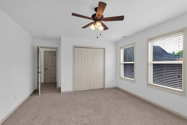 2726 Wynthrope Hall Dr, Murfreesboro, TN 37129 - unfurnished bedroom with carpet, a closet, baseboards, and ceiling fan