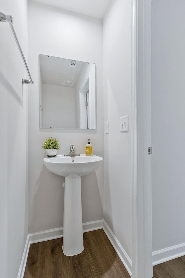3008 Sapgate Ln, Nashville, TN 37207 - bathroom featuring baseboards and wood finished floors