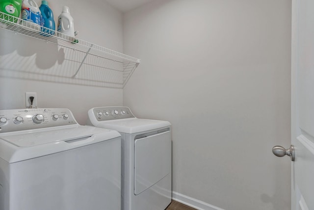 3008 Sapgate Ln, Nashville, TN 37207 - laundry area with baseboards, independent washer and dryer, laundry area, and wood finished floors
