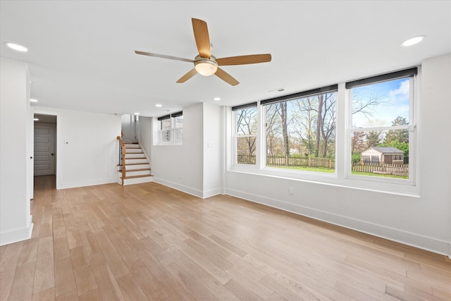 276 E Porters Bluff Rd E, Clarksville, TN 37040 - unfurnished living room with stairway, recessed lighting, light wood-type flooring, baseboards, and ceiling fan