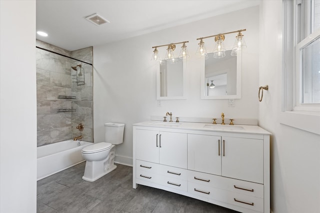276 E Porters Bluff Rd E, Clarksville, TN 37040 - full bathroom with double vanity, visible vents, toilet, and a sink