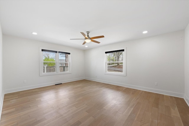 276 E Porters Bluff Rd E, Clarksville, TN 37040 - unfurnished room with a ceiling fan, baseboards, and light wood finished floors