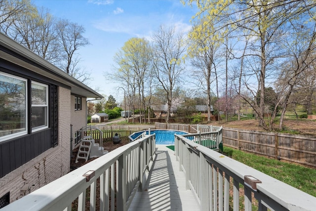 276 E Porters Bluff Rd E, Clarksville, TN 37040 - deck featuring a fenced in pool and a fenced backyard