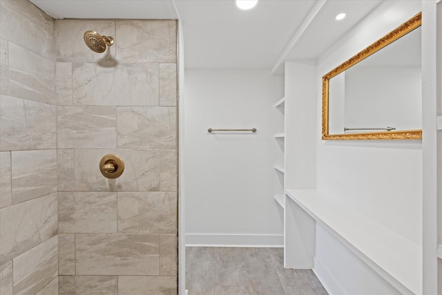 276 E Porters Bluff Rd E, Clarksville, TN 37040 - bathroom with baseboards, a tile shower, and recessed lighting