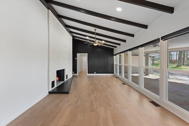 276 E Porters Bluff Rd E, Clarksville, TN 37040 - interior space featuring a ceiling fan, visible vents, a fireplace, and light wood-type flooring