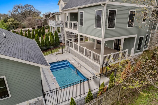 1405 Ashwood Ave, Nashville, TN 37212 - view of pool with a patio area, a fenced in pool, and fence