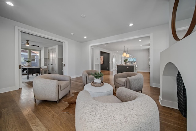 1405 Ashwood Ave, Nashville, TN 37212 - living room featuring recessed lighting, baseboards, and wood finished floors