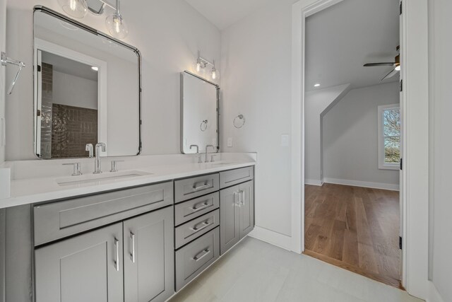 1405 Ashwood Ave, Nashville, TN 37212 - full bath featuring double vanity, a sink, a ceiling fan, and baseboards