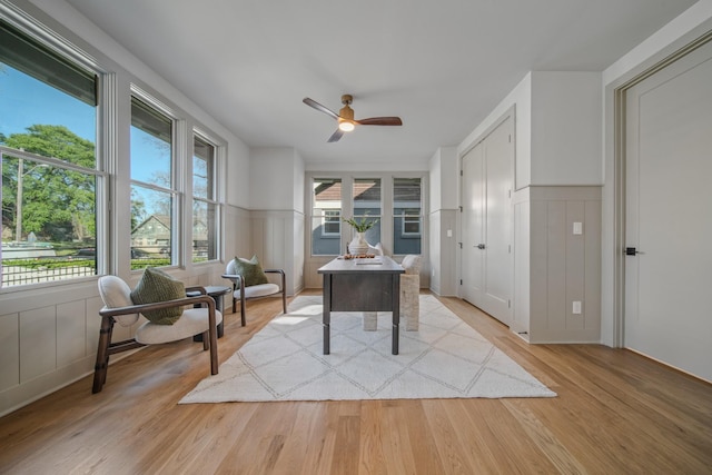 1405 Ashwood Ave, Nashville, TN 37212 - dining area featuring plenty of natural light, light wood finished floors, wainscoting, and ceiling fan