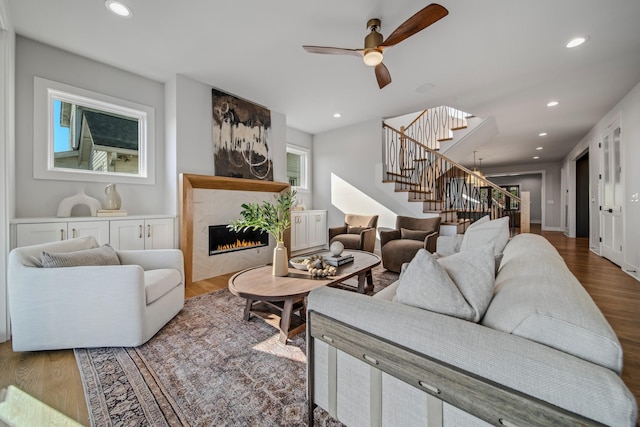 1405 Ashwood Ave, Nashville, TN 37212 - living area with wood finished floors, recessed lighting, a warm lit fireplace, and stairway