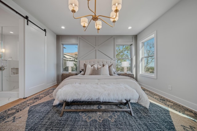 1405 Ashwood Ave, Nashville, TN 37212 - bedroom with a chandelier, baseboards, recessed lighting, and a barn door