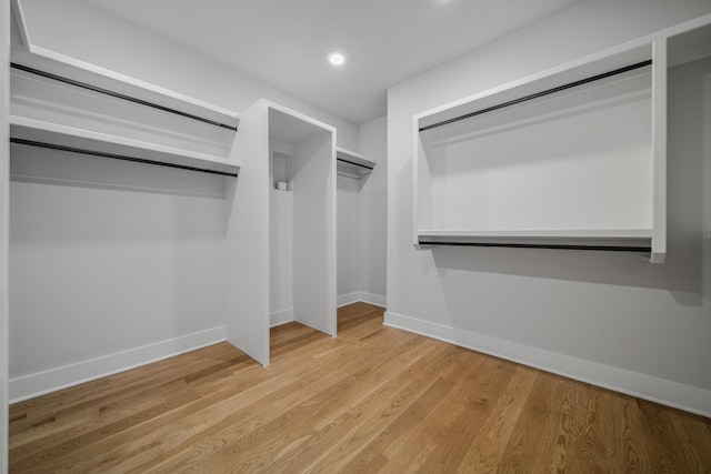 1405 Ashwood Ave, Nashville, TN 37212 - walk in closet with wood finished floors