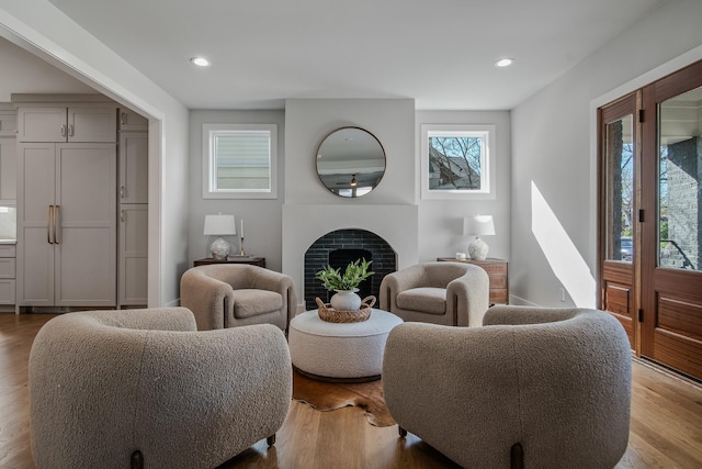 1405 Ashwood Ave, Nashville, TN 37212 - living room featuring recessed lighting, a fireplace, and wood finished floors