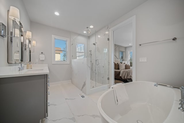 1405 Ashwood Ave, Nashville, TN 37212 - bathroom featuring vanity, baseboards, a soaking tub, a marble finish shower, and marble finish floor