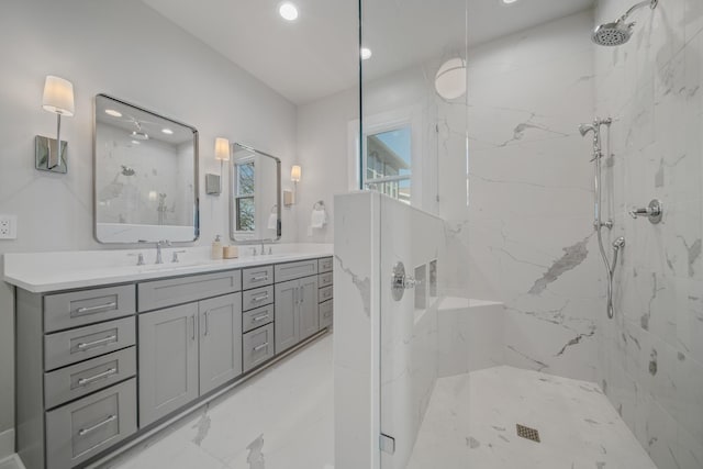 1405 Ashwood Ave, Nashville, TN 37212 - full bathroom with marble finish floor, double vanity, a marble finish shower, and a sink