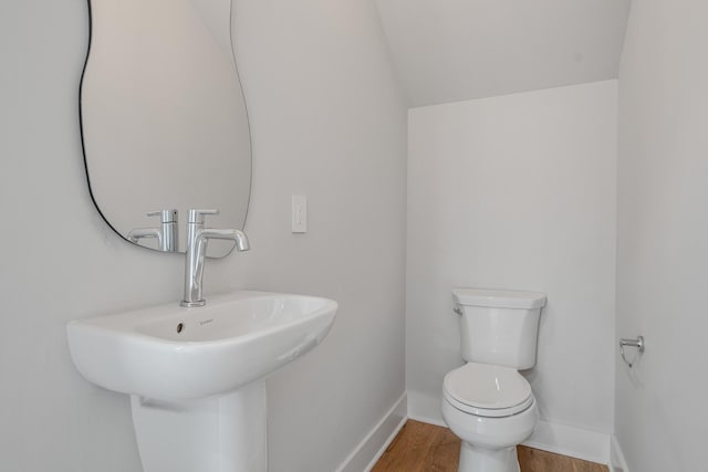 1405 Ashwood Ave, Nashville, TN 37212 - bathroom with a sink, toilet, wood finished floors, and baseboards