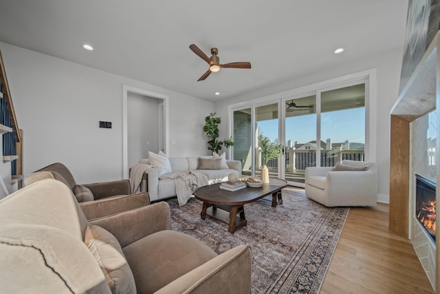 1405 Ashwood Ave, Nashville, TN 37212 - living area featuring recessed lighting, ceiling fan, light wood-style floors, and a glass covered fireplace