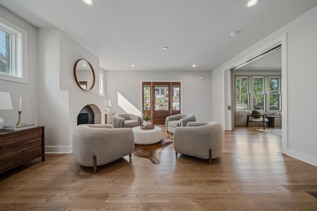 1405 Ashwood Ave, Nashville, TN 37212 - living area featuring a wealth of natural light, light wood-type flooring, recessed lighting, and a fireplace