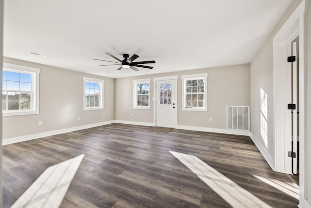2999 Fayetteville Hwy, Belfast, TN 37019 - unfurnished living room with baseboards, visible vents, dark wood-style flooring, and a ceiling fan
