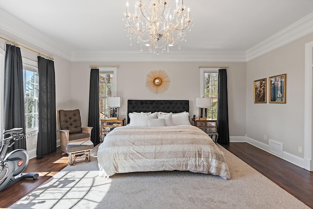4 Colonel Winstead Dr, Brentwood, TN 37027 - bedroom featuring wood finished floors, a notable chandelier, ornamental molding, and multiple windows