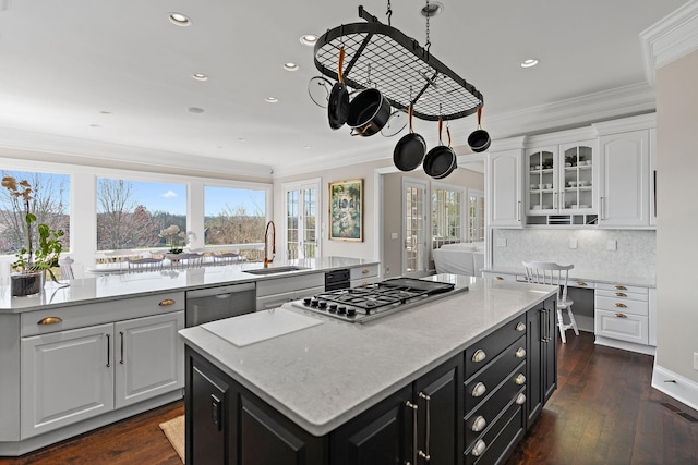 4 Colonel Winstead Dr, Brentwood, TN 37027 - kitchen featuring stainless steel appliances, dark cabinetry, a sink, a kitchen island, and white cabinetry