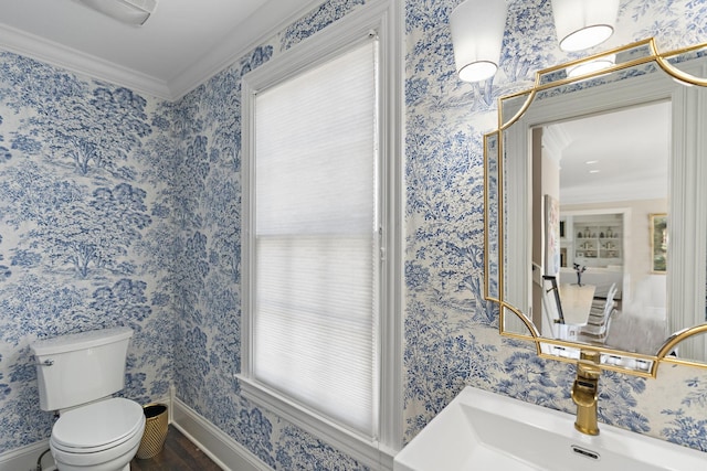 4 Colonel Winstead Dr, Brentwood, TN 37027 - half bath featuring crown molding, wood finished floors, wallpapered walls, a sink, and toilet
