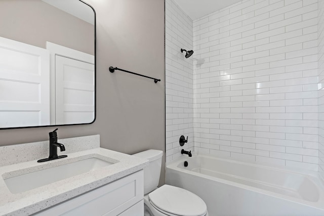 bathroom with toilet, vanity, and shower / bathtub combination
