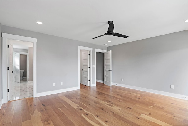 unfurnished bedroom featuring baseboards, recessed lighting, a ceiling fan, and light wood finished floors