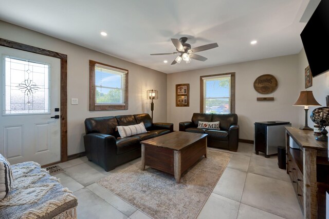 living area with plenty of natural light, recessed lighting, and ceiling fan