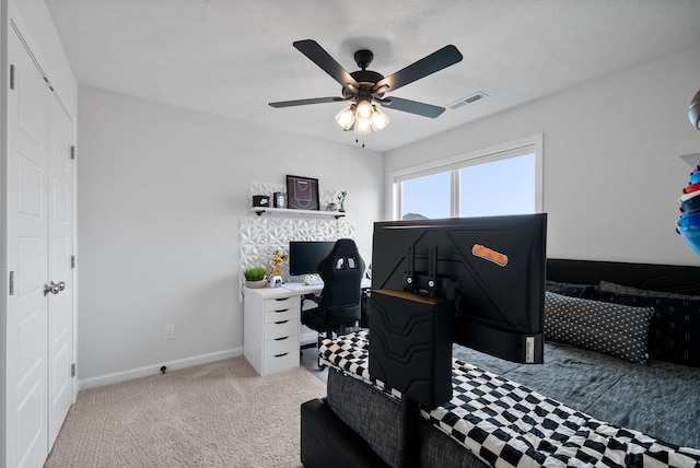 221 Wesson Dr, Clarksville, TN 37043 - carpeted bedroom with baseboards, ceiling fan, and visible vents