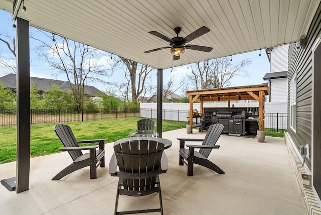 221 Wesson Dr, Clarksville, TN 37043 - view of patio with a fenced backyard, a fire pit, and a ceiling fan