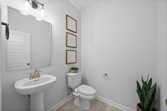 221 Wesson Dr, Clarksville, TN 37043 - half bathroom featuring baseboards and toilet